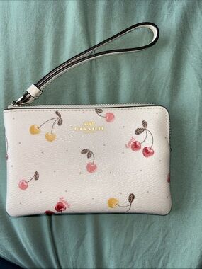 COACH Cream Cherry Print Wristlet with Multicolor Cherries